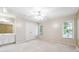 Spacious bedroom with ceiling fan, carpet and natural light at 936 Bramble Oak Ct, Powder Springs, GA 30127