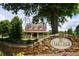 Charming home in Oakleigh, featuring a picturesque facade, landscaped grounds, and a welcoming entrance at 936 Bramble Oak Ct, Powder Springs, GA 30127