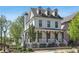 Charming two-story home with a welcoming front porch and dormer windows, set in a well-manicured community at 123 Cricket Ln, Alpharetta, GA 30009