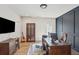 Well-lit home office featuring custom desk and ample space at 123 Cricket Ln, Alpharetta, GA 30009