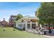 Chiringa Restaurant features a spacious outdoor seating area overlooking a vibrant community park at 123 Cricket Ln, Alpharetta, GA 30009