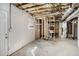 Unfinished basement with exposed pipes and unfinished wall at 474 Waterford Nw Rd, Atlanta, GA 30318