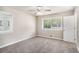 Comfortable bedroom with large windows offering natural light and soft carpeting at 474 Waterford Nw Rd, Atlanta, GA 30318