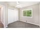 Inviting bedroom with carpet, a closet and a window for natural light at 474 Waterford Nw Rd, Atlanta, GA 30318