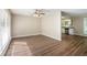 Bright living room with hardwood floors, a ceiling fan, and plenty of natural light at 474 Waterford Nw Rd, Atlanta, GA 30318