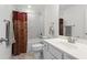 Stylish bathroom featuring a bathtub and shower combo with patterned curtains at 5520 Allegre Pl, Cumming, GA 30028