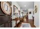 Elegant entryway with hardwood floors, decorative rug, and tasteful decor at 5520 Allegre Pl, Cumming, GA 30028