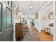 Elegant foyer featuring hardwood floors, wainscoting, and stylish decor that leads into the living spaces at 2620 Margaret Mitchell Dr, Atlanta, GA 30327