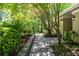 Charming front entrance with a stone walkway, lush greenery, and well-maintained landscaping at 2620 Margaret Mitchell Dr, Atlanta, GA 30327