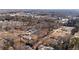 Aerial view of neighborhood and tree-lined streets in a quaint community at 3595 South Nw St, Duluth, GA 30096