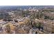 Aerial view of a neighborhood with homes surrounded by trees at 3595 South Nw St, Duluth, GA 30096
