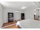 Modern basement bedroom features a comfortable bed, stylish furniture, and ample closet space at 3595 South Nw St, Duluth, GA 30096