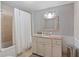Bright bathroom with modern fixtures, subway tile and a shower and tub combination at 3595 South Nw St, Duluth, GA 30096
