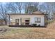 Charming single-story home featuring a covered front porch with traditional architectural details at 3595 South Nw St, Duluth, GA 30096