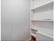 Functional storage with painted shelving and white walls at 3595 South Nw St, Duluth, GA 30096