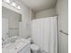 Bathroom features a shower, vanity, and neutral finishes at 3862 Firewood Ln # 110, Suwanee, GA 30024