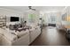 Expansive living room featuring stylish furnishings and lots of natural light at 3862 Firewood Ln # 110, Suwanee, GA 30024