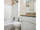Bathroom with shower-tub combo, granite vanity, and white cabinets and fixtures at 3995 Emerald North Dr, Decatur, GA 30035