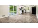 Bright kitchen featuring stainless appliances, white cabinets, and wood-look flooring at 3995 Emerald North Dr, Decatur, GA 30035