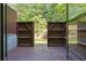View of a private fenced in porch with an entrance leading to a peaceful wooded view at 5058 Meadow Ne Ln, Marietta, GA 30068