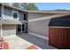 The home features a private courtyard with gray siding and concrete flooring at 5058 Meadow Ne Ln, Marietta, GA 30068
