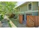 An inviting backyard with a wooden fence and porch, accompanied by an adjacent walkway at 5058 Meadow Ne Ln, Marietta, GA 30068