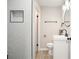 Updated bathroom features hexagon tile shower with niche, and modern fixtures at 5058 Meadow Ne Ln, Marietta, GA 30068