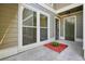 Charming front entrance with large window and colorful flowerbeds at 5058 Meadow Ne Ln, Marietta, GA 30068