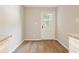 Bright eat-in kitchen features updated white cabinets and granite countertops at 5058 Meadow Ne Ln, Marietta, GA 30068