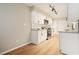 Beautifully updated kitchen features stainless appliances, white cabinets, and granite countertops at 5058 Meadow Ne Ln, Marietta, GA 30068