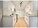 Stylish kitchen features white cabinets, subway tile backsplash and granite counters at 5058 Meadow Ne Ln, Marietta, GA 30068