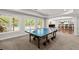 Basement with a pool table and nearby access to a kitchen area at 770 Pine Leaf Ct, Alpharetta, GA 30022