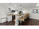 Basement bar area featuring granite countertops, stainless steel appliances and seating at 770 Pine Leaf Ct, Alpharetta, GA 30022