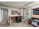 Unfinished basement area with work bench, tool storage, and shelving at 770 Pine Leaf Ct, Alpharetta, GA 30022