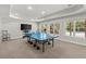 Basement featuring large windows, recessed lighting, and a pool table at 770 Pine Leaf Ct, Alpharetta, GA 30022