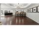 Finished basement with a bar-height countertop and hardwood flooring at 770 Pine Leaf Ct, Alpharetta, GA 30022