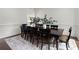 Formal dining room with large table and stylish decor for entertaining at 770 Pine Leaf Ct, Alpharetta, GA 30022