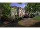 Stately home with a meticulously landscaped front yard and elegant architectural details at 770 Pine Leaf Ct, Alpharetta, GA 30022