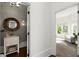 Hallway view leading to a powder room and a bedroom sitting area at 770 Pine Leaf Ct, Alpharetta, GA 30022