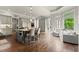 Large kitchen with an island, bar seating, stainless steel appliances, and natural light at 770 Pine Leaf Ct, Alpharetta, GA 30022