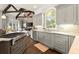 Well-appointed kitchen with stainless appliances, countertops, and hardwood floors at 770 Pine Leaf Ct, Alpharetta, GA 30022