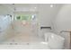 Bright main bathroom with a large shower, soaking tub, and modern finishes at 770 Pine Leaf Ct, Alpharetta, GA 30022