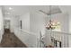 Bright foyer with chandelier, staircase, and natural light at 770 Pine Leaf Ct, Alpharetta, GA 30022