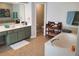 Bright bathroom with a soaking tub, double vanity, and modern fixtures at 101 Brendylynn Trce, Woodstock, GA 30188