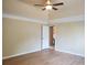 Sunny room with wood floors, neutral paint, and a modern ceiling fan offers a bright and airy feel at 101 Brendylynn Trce, Woodstock, GA 30188