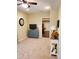Finished bonus room provides neutral carpet, ceiling fan, and view into adjacent recreation room with pool table at 101 Brendylynn Trce, Woodstock, GA 30188