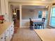 Cozy dining area features tile flooring, natural light, and neutral paint, perfect for Gathering meals at 101 Brendylynn Trce, Woodstock, GA 30188