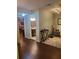 Hallway leads to a bathroom and a game area with a pool table at 101 Brendylynn Trce, Woodstock, GA 30188
