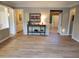 Open living room showcasing classic trim, hardwood floors, and seamless flow to other living areas at 101 Brendylynn Trce, Woodstock, GA 30188