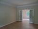 Office space featuring double doors, neutral walls, and hardwood floors at 101 Brendylynn Trce, Woodstock, GA 30188